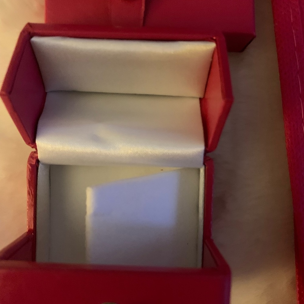 Helen Ficalora empty jewelry bag and box